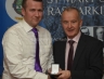 Michael Hasson presents Karol Doherty with an award for refereeing the Ulster Intermediate League Club Final 2015.